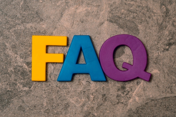 FAQ spelled using colorful wooden letter cubes depicting Energy-Efficient Air Conditioner questions