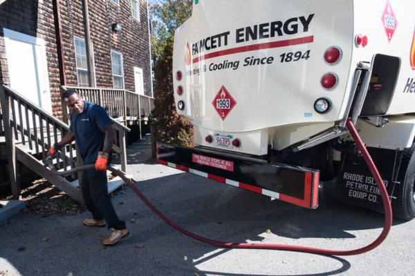 Fawcett Energy driver and heating oil delivery truck