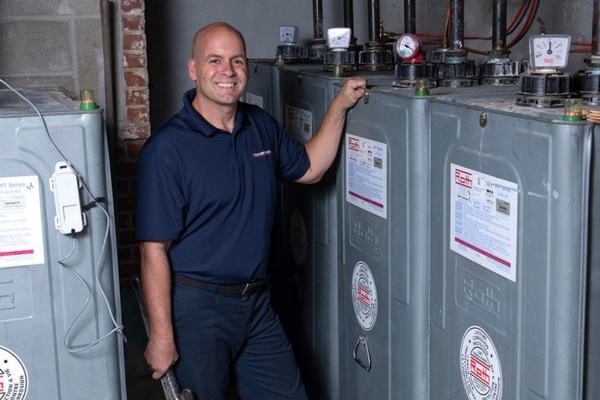 Fawcett Energy staff tending to oil tanks