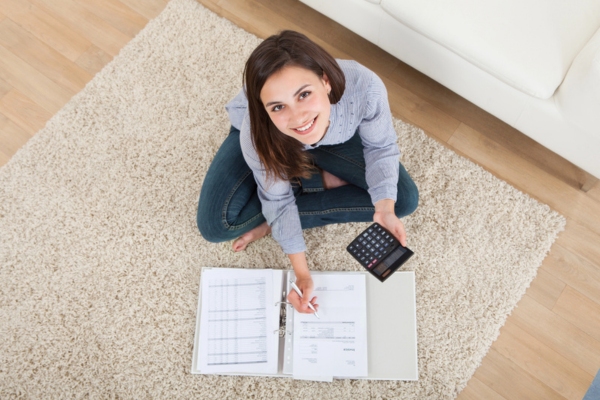 Woman Calculating Potential Energy Savings