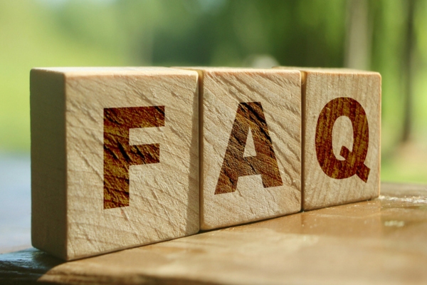 FAQ spelled using wooden letter cubes depicting HVAC Service Myths questions