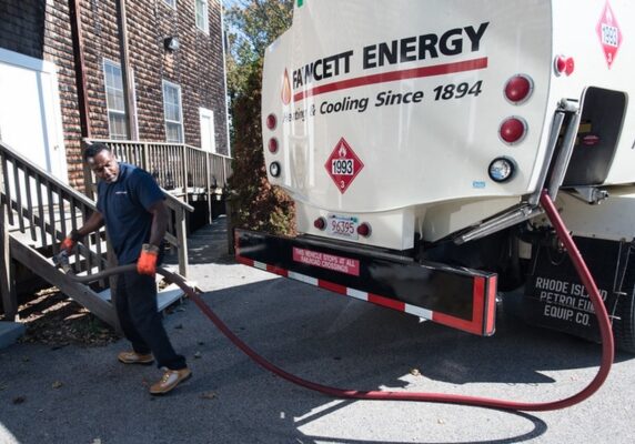 Fawcett Energy driver and heating oil delivery truck