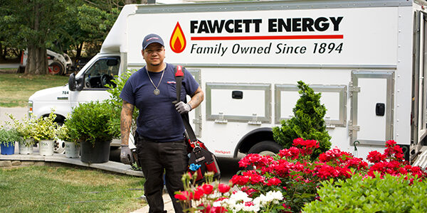 hvac technician servicing home heating and cooling equipment